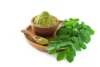 moringa-powder-wooden-bowl-with-original-fresh-moringa-leaves-isolated-white-background-size-blog-detail-v-1 Plain Moringa(Drumstic leaves) powder